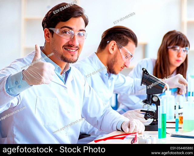 The team of chemists working in the lab