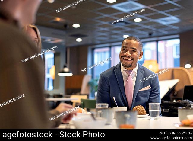 Smiling man in cafe