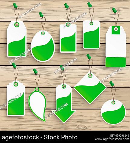 Green price stickers on the wooden background. Eps 10 vector file