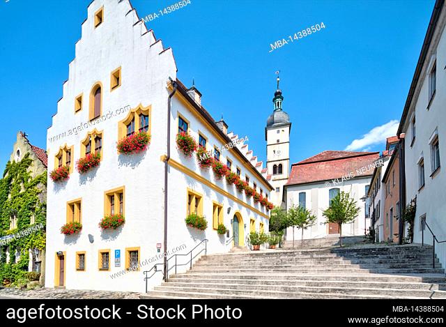 Town hall, St. Johannis church, house facade, flower decoration, alley, village view, Mainbernheim, Franconia, Bavaria, Germany, Europe