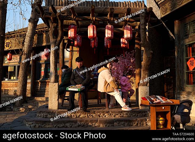 CHINA, BEIJING - FEBRUARY 5, 2023: People visit Gubei Water Town during the Lantern Festival. The Lantern Festival, a Chinese traditional festival celebrated on...