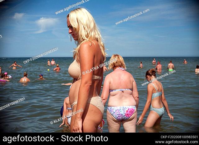 Poland, Wladyslawowo 05.08.2015. Tourists at the beach in the popular seaside resort. photo CTK / Grzegorz Klatka
