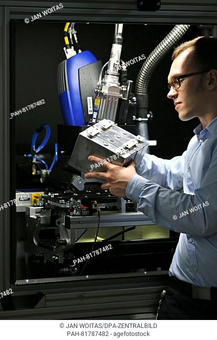 Development Engineer Philipp Just prepares for testing a battery module in the ThyssenKrupp System Engineering GmbH in Limbach-Oberfrohna, 27 June 2016