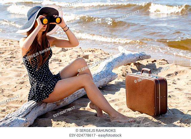 Beauty, summer. Cute, attractive woman on the beach
