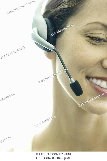 Woman wearing headset, cropped