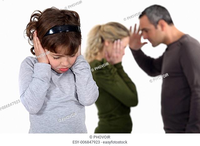 Daughter stood with arguing parents