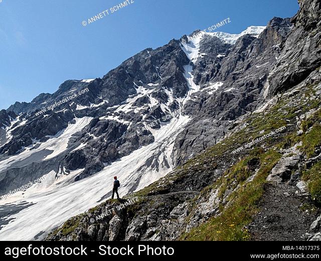 the tabaretta via ferrata is one of the most difficult via ferratas in italy in high alpine terrain. here the view of the north face of the ortler