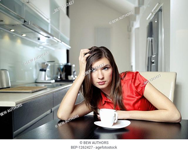 Woman with a cup of coffee or tea