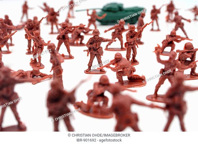 Plastic soldiers and a plastic tank, symbolic image of war games