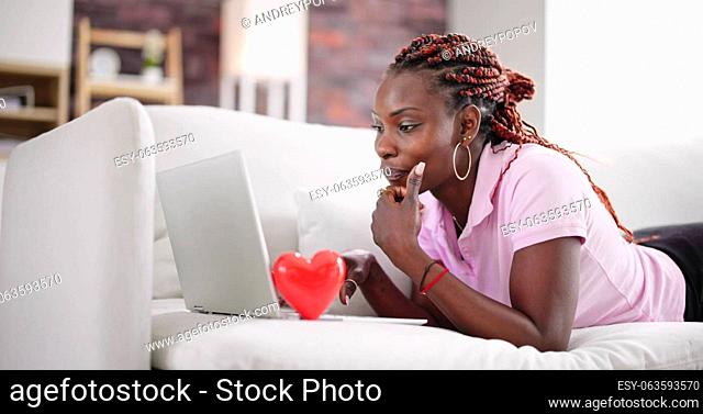 Long Distance Dating And Online Relationship. Woman Using Laptop