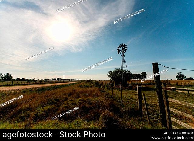 View of aermotor windmill in agricultural field, Uruguay, South America