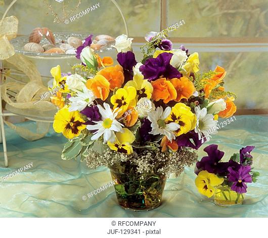 bouquet with pansy violets , marguerites and roses