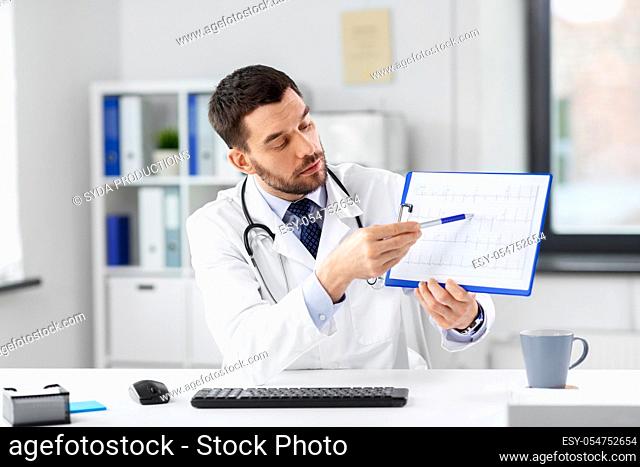 doctor with cardiogram having video call at clinic