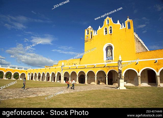 Visitors in front of the Monastery-Convent Of San Antonio De Padua, Izamal, Yucatan Province, Mexico, North America