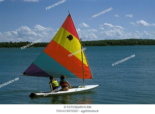sailing, MN, Minnesota, Alexandria, A couple sails a sunfish on Maple Lake in Alexandria in the summer