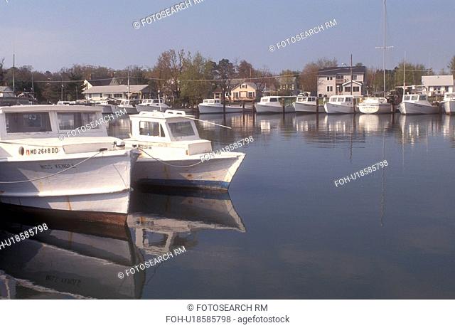 Chesapeake Bay, Maryland, Tilghman Island, Dogwood Harbor, Reflection of boats moored in the calm waters of Dogwood Harbor on Tilgham Island