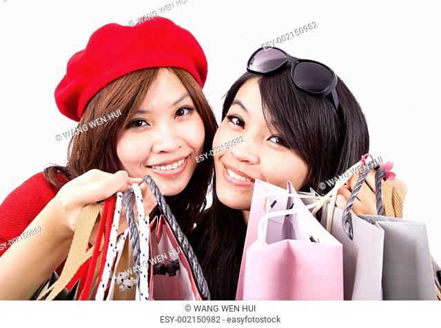 Two asian shopping girl isolated on white background