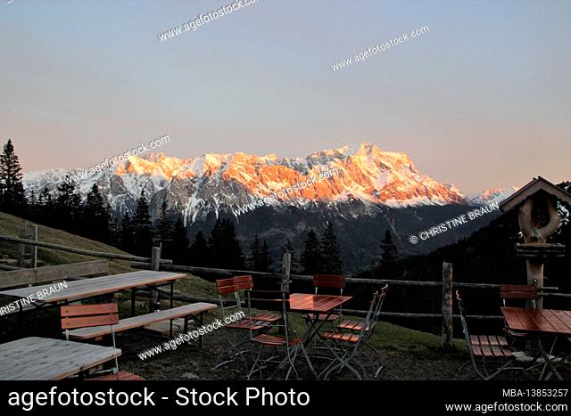 Stepbergalm in front of Zugspitze, near Garmisch, Wetterstein Mountains, Upper Bavaria, Bavaria, Germany, hospitality, inviting, seating