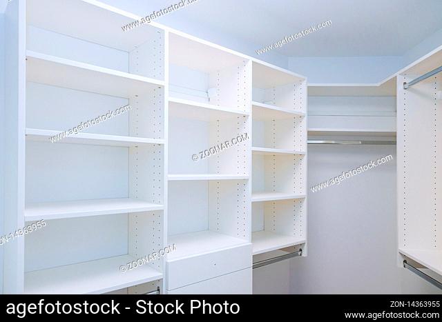 Assembling furniture installation of shelves with new apartment a shelf new home construction of interior room