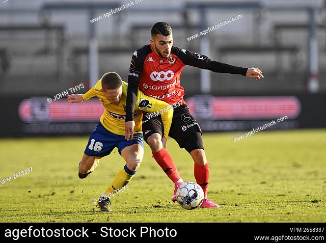 Westerlo's Leo Seydoux and Seraing's Georges Mikautadze fight for the ball during a soccer match between RFC Seraing and KVC Westerlo
