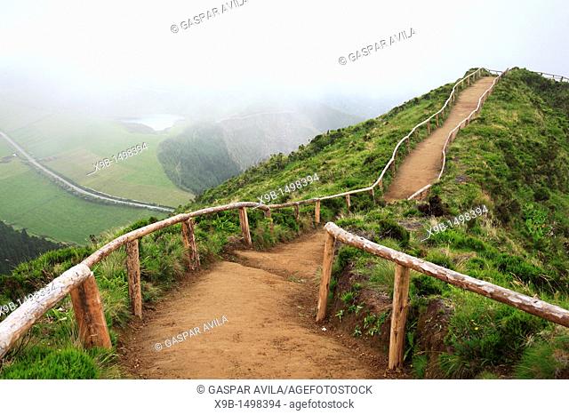 Empty walking trail in foggy weather nearby Sete Cidades crater  Sao Miguel island, Azores, Portugal