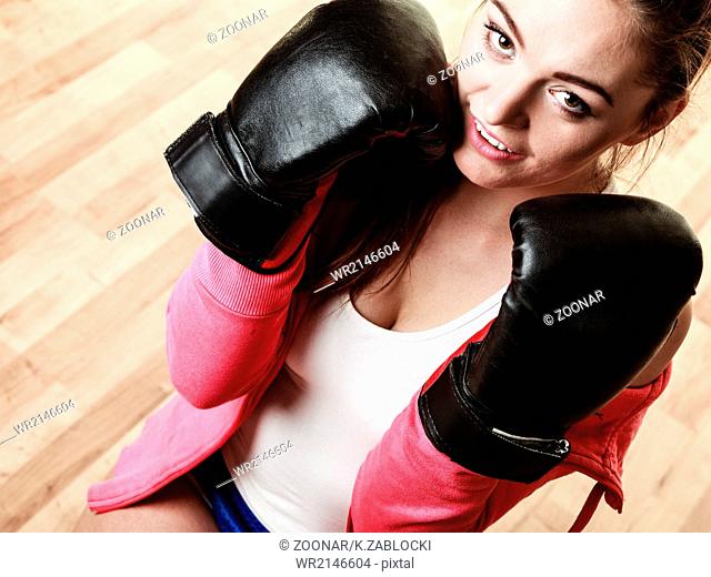 Fit sporty woman boxing
