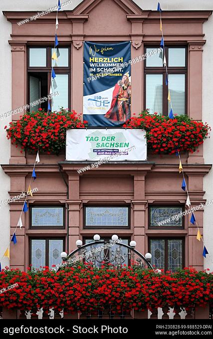 28 August 2023, Saxony, Aue: Posters at the town hall draw attention to the ""Day of the Saxons"". For the first time since 2019