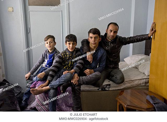 Refugees from Afghanistan in their crowded room in a hostel in Cesme, Izmir, Turkey. They are waiting to be taken by smugglers to Greece