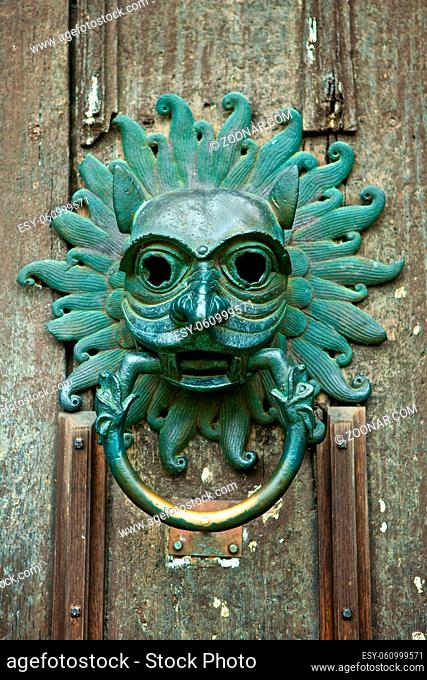 Antique door knocker at the front door of Durham Cathedral, England