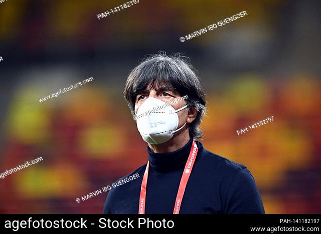 Joachim Loew, Federal Coach, (Germany) with mouth and nose protection. GES / Football / World Cup qualification: Romania - Germany, March 28