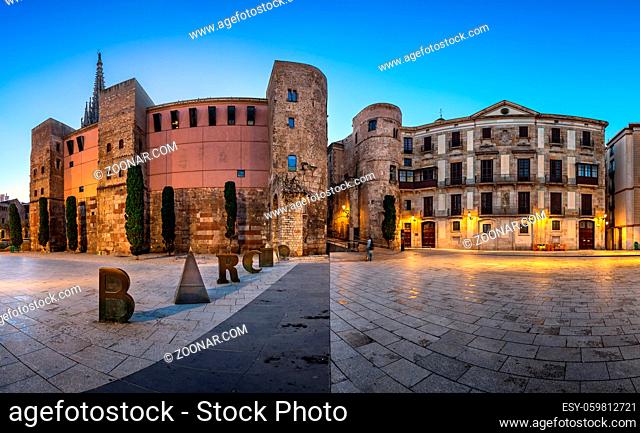 BARCELONA, SPAIN - NOVEMBER 16, 2014: Ancient Roman Gate and Placa Nova in Barri Gotic Quarter, Barcelona. Barri Gotic is the centre of the old city of...