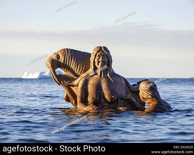 Mother of the sea, Sassuma Arnaa - a legendary figure in Inuit culture. Sculpure by Christian Rosing in the colonial harbour Nuuk the capital of Greenland...