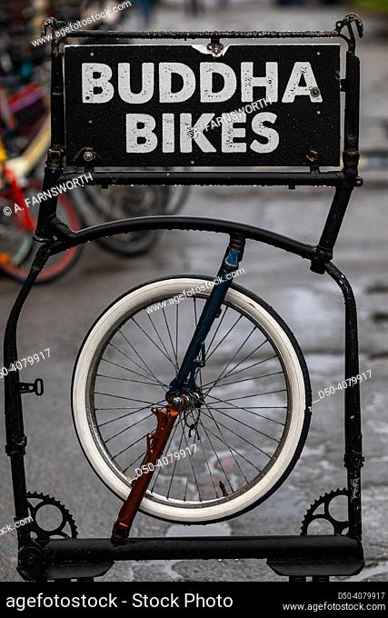 Copenhagen, Denmark A metallic sign for Buddha Bikes, a small bike shop. ,