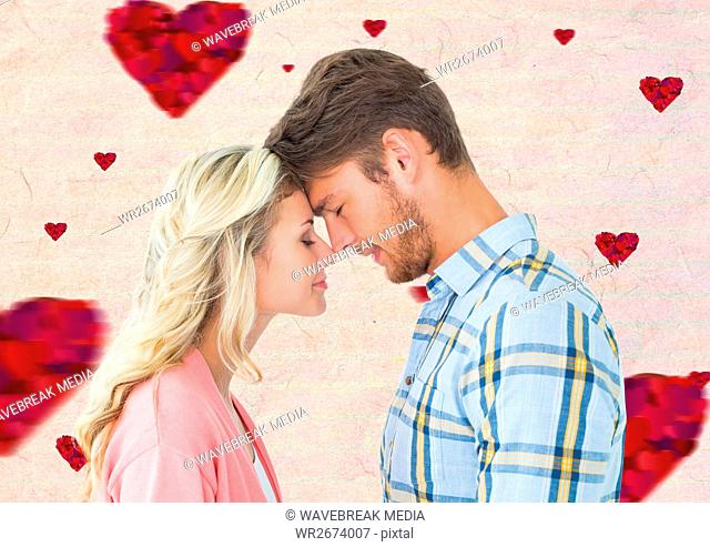 Romantic couple standing with closed eyes