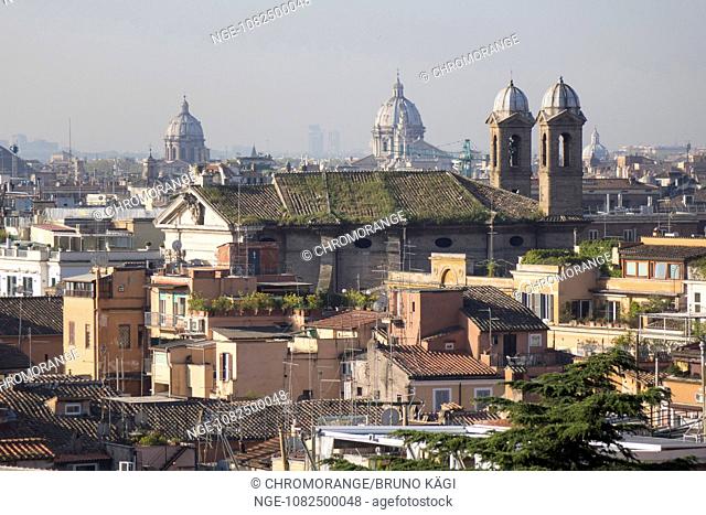 view over the old city of Rome, its churches, cupolas and roof gardens