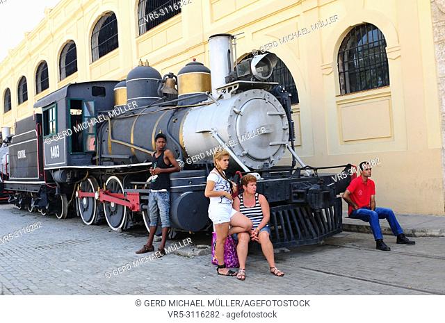 Will Cuba ever find a way to the capitalistic world? A old steam locomotive in front of the harbour building in Havanna