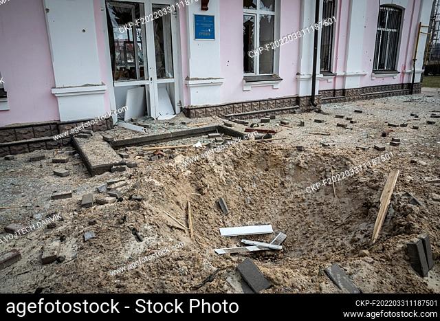 crater after the rocket explosion in front of the station building, pictured 29.03.2022 (CTK Photo/Vojtech Darvik Maca)