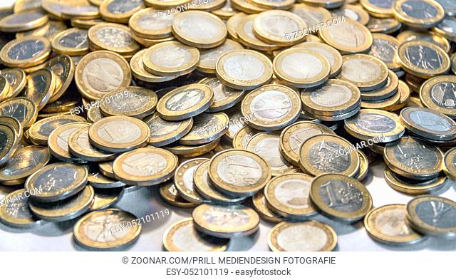 full frame picture showing lots of 1 euro coins