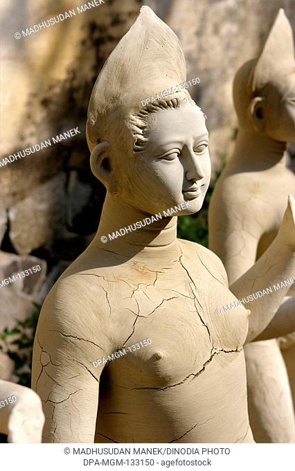 Incomplete goddess Durga sculpture made of clay for Durga Pooja celebration ; Rajkot ; Gujarat; India