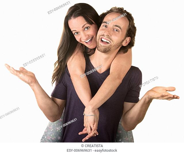 Happy woman riding the back of a smiling husband