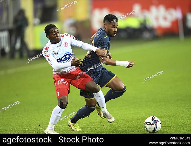 Kortrijk's Dylan Mbayo and Anderlecht's Amir Murillo fight for the ball during a soccer game between RSC Anderlecht and KV Kortrijk