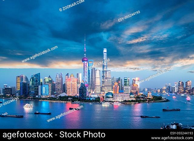 charming shanghai skyline in twilight, pudong financial center and huangpu river, China