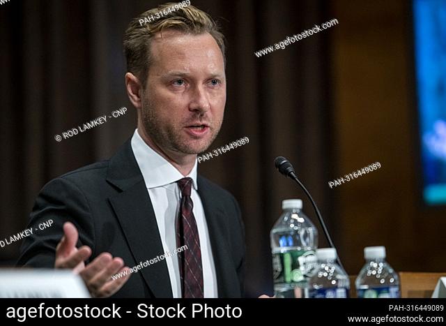 Andrew C. Adams, Director, Task Force KleptoCapture, United States Department of Justice, responds to questions during a Senate Committee on Banking, Housing