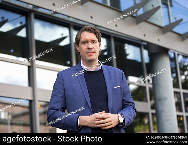 21 September 2022, North Rhine-Westphalia, Duesseldorf: The lawyer Manuel Reiger of those affected by the Bottrop pharmacy scandal is standing before the...