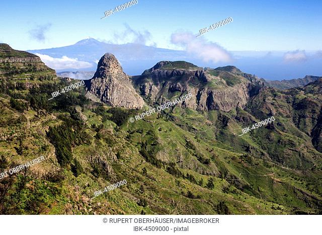 Roque Agando, at back volcano Teide on Tenerife, Garajonay National Park, La Gomera, Canary Islands, Spain