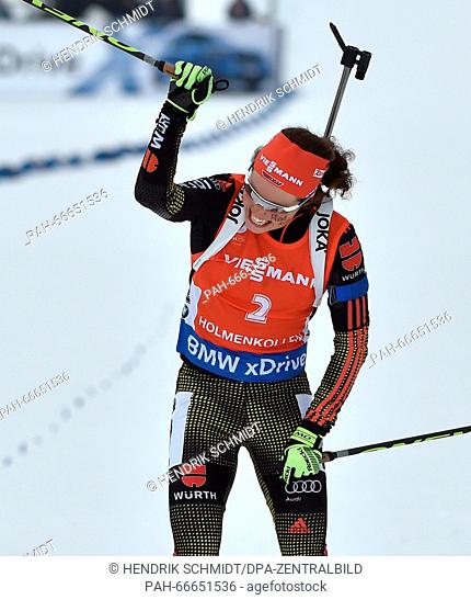 Laura Dahlmeier from Germany celebrates after crossing the finish line during the Women 12.5km Mass Start competition at the Biathlon World Championships