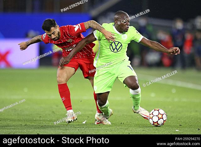 (LR) Suso (FC Sevilla) versus Jerome Roussillon (VfL Wolfsburg) Soccer UEFA Champions League, group stage group G, 2nd matchday