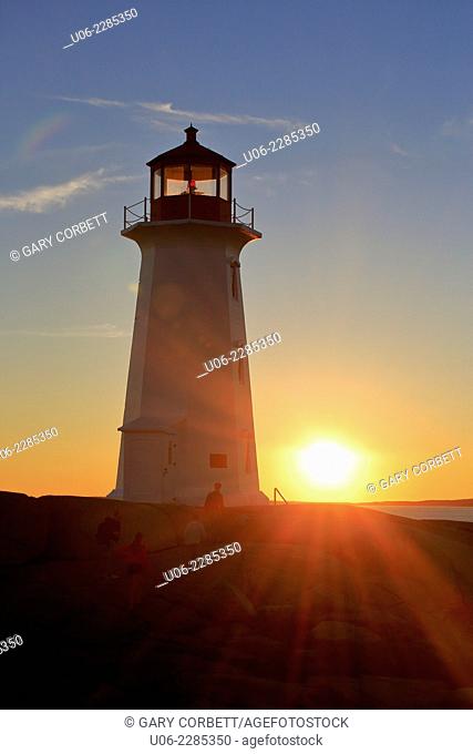Peggy's Cove Lighthouse, Nova Scotia, Canada at sunset
