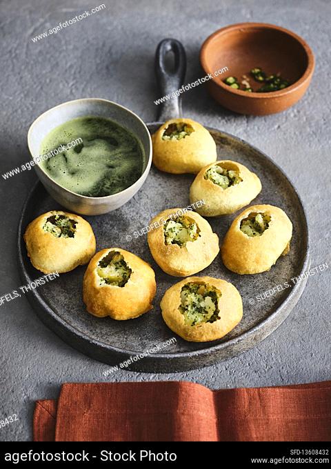 Pani Puri with spicy potato-chickpea filling