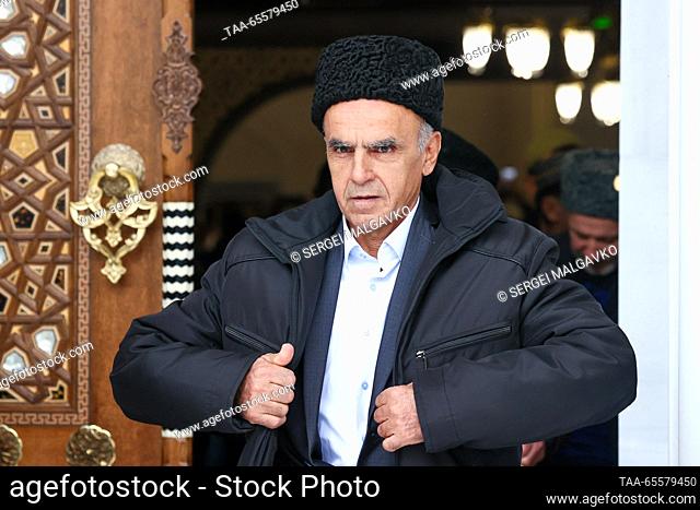 RUSSIA, SIMFEROPOL - DECEMBER 9, 2023: A believer leaves after a mass prayer at the newly built Cathedral Mosque, the largest one in Crimea